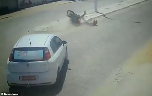Car Knocks Down Rider In India Photo Credit Daily Mail Uk
