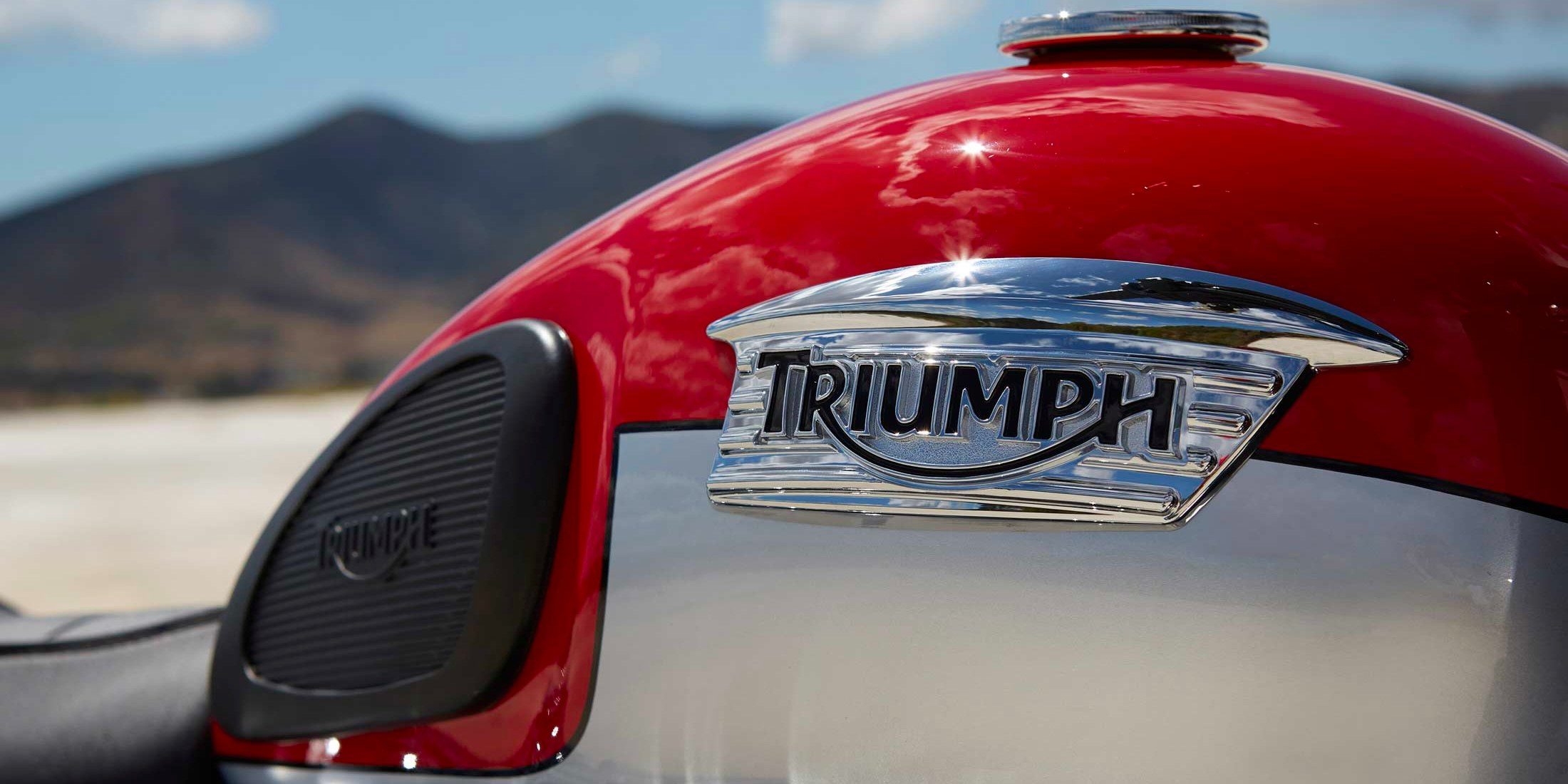 Triumph Header